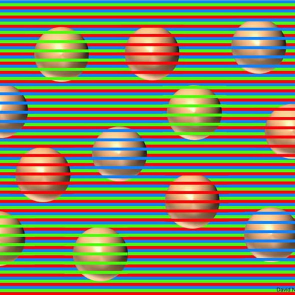 The balls are all the same exact color beige.(zoom in).
