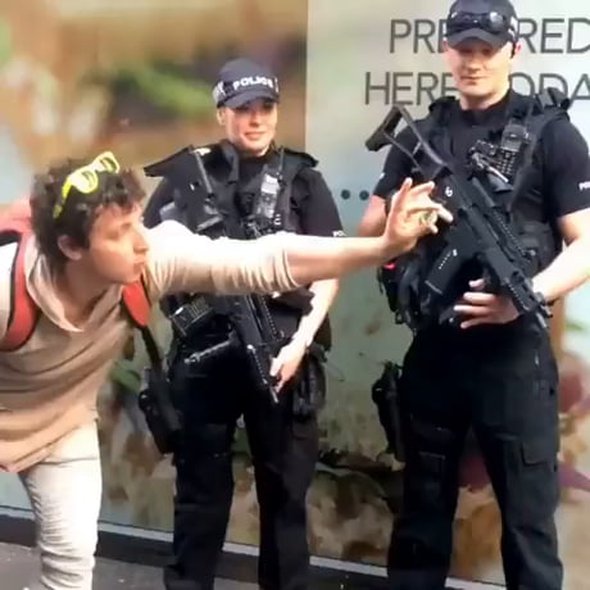 Magician performs magic trick in front of Armed Police...this girl has not forgotten how to be genuinely surprised and admired