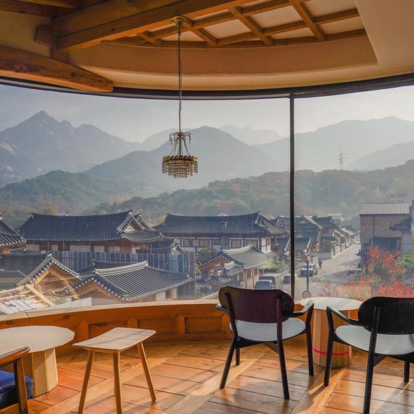 Cafe with a view of the traditional styled houses at the base of Mt Bukhan, Eunpyeong District, Seoul, South Korea