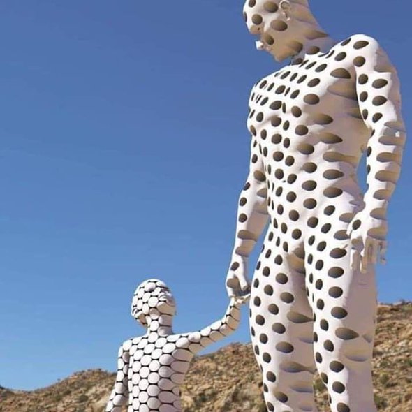 The statue of the son was made from pieces of the father to represent what parents do to build the lives of their children